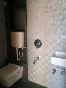 Common Bathroom Image of 670 Sq.ft 1 BHK Apartment / Flat for sale in Lodha Palava Premier, Dombivli East Thane for Rs. 4420000