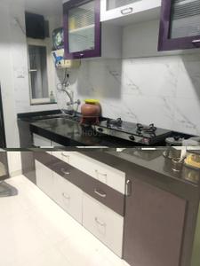 Kitchen Image of 1059 Sq.ft 2 BHK Apartment / Flat for rent in Kedar Vanjape Balaji Whitefield Rainbow Nation, Sus Pune for Rs. 33000