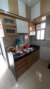 Kitchen Image of 660 Sq.ft 1 BHK Apartment / Flat for rent in Ajmera Exotica, Wagholi Pune for Rs. 15000