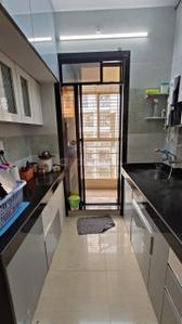 Kitchen Image of 650 Sq.ft 1 BHK Apartment / Flat for sale in Thakurli Thane for Rs. 4700000