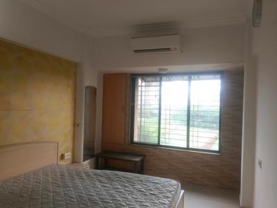 Bedroom Image of 1050 Sq.ft 2 BHK Apartment / Flat for rent in Gayatri Darshan, Kandivali East Mumbai for Rs. 51000