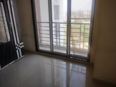Bedroom Image of 695 Sq.ft 1 BHK Apartment / Flat for sale in Bhoomi Lawns Phase II, Shilgaon Thane for Rs. 3900000
