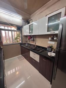 Kitchen Image of 900 Sq.ft 2 BHK Apartment / Flat for sale in Romell Diva, Malad West Mumbai for Rs. 22000000