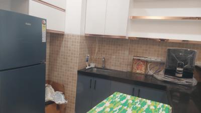 Kitchen Image of 640 Sq.ft 1 RK Studio for rent in Lodha Belmondo, Gahunje Pune for Rs. 37500