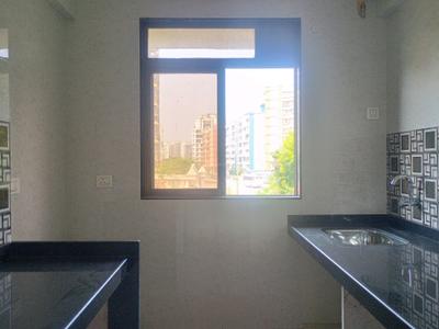 Kitchen Image of 585 Sq.ft 1 BHK Apartment / Flat for sale in Swaminarayan City, Dombivli West Thane for Rs. 4420000