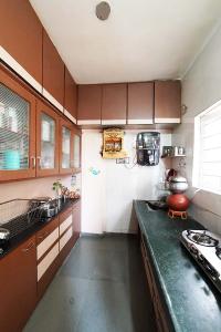 Kitchen Image of 675 Sq.ft 1 BHK Apartment / Flat for sale in Shivanand Apartment, Ghatlodiya Ahmedabad for Rs. 4300000