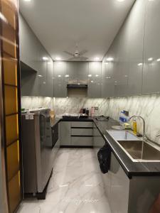 Kitchen Image of 1100 Sq.ft 1 BHK Builder Floor for rent in Sector 27 Gurgaon for Rs. 36000