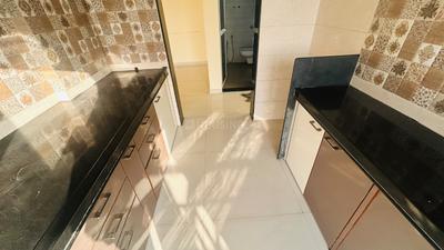 Kitchen Image of 775 Sq.ft 1 BHK Apartment / Flat for rent in Shree Chamunda Garden, Thakurli Thane for Rs. 16000