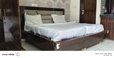 Bedroom Image of Sumit Coliving PG  in Sector 52, Noida