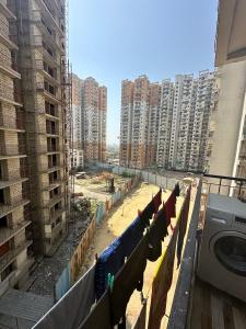 Balcony Image of 972 Sq.ft 2 BHK Apartment / Flat for rent in Charms Castle, Raj Nagar Extension Ghaziabad for Rs. 17000