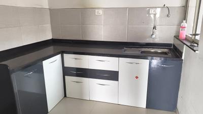 Kitchen Image of 1050 Sq.ft 2 BHK Apartment / Flat for sale in Darshan Parklane Premier, Wagholi Pune for Rs. 6000000