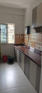 Kitchen Image of 1050 Sq.ft 2 BHK Apartment / Flat for rent in Gariahat Kolkata for Rs. 35000