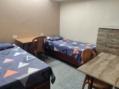 Bedroom Image of Mohit PG in Moti Bagh, New Delhi