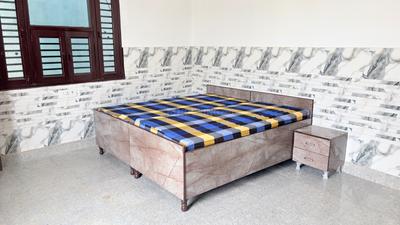 Bedroom Image of Ankit pg in Sector 45, Noida