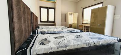Bedroom Image of HOMELY SPACE PG in Sector 71, Noida