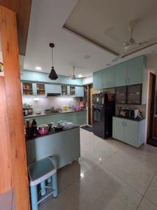 Kitchen Image of 2200 Sq.ft 3 BHK Apartment / Flat for sale in Saanidhya Aavkar 96, Sargasan Gandhinagar for Rs. 12200000