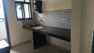 Kitchen Image of 1050 Sq.ft 2 BHK Apartment / Flat for sale in Majestique City Building F, Wagholi Pune for Rs. 6000000