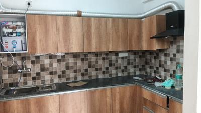 Kitchen Image of 910 Sq.ft 2.5 BHK Apartment / Flat for rent in Prateek Grand City, Siddharth Vihar Ghaziabad for Rs. 26000