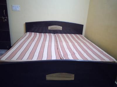Bedroom Image of 650 Sq.ft 1 BHK Builder Floor for rent in Dwarka Mor New Delhi for Rs. 12502