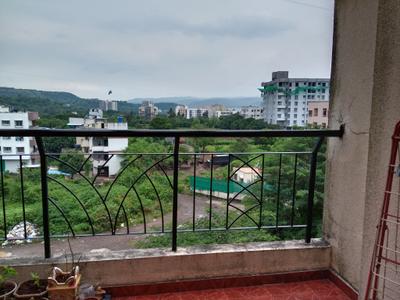 Balcony Image of 600 Sq.ft 1 BHK Apartment / Flat for sale in Maple Aapla Ghar Kirkatwadi, Kirkatwadi Pune for Rs. 3200000