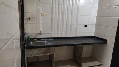 Kitchen Image of 700 Sq.ft 1 BHK Apartment / Flat for sale in Aaron Kanupriya, Kamothe Navi Mumbai for Rs. 6600000