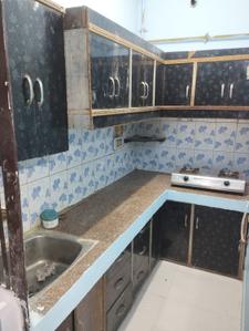 Kitchen Image of 810 Sq.ft 2 BHK Builder Floor for rent in Dwarka Mor New Delhi for Rs. 15000