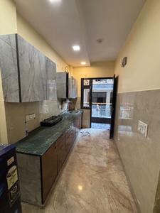 Kitchen Image of 650 Sq.ft 1 BHK Builder Floor for rent in Maurya Enclave, Pitampura New Delhi for Rs. 20000
