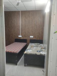 Bedroom Image of Girls pg in noida in Sector 27, Noida