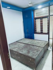 Bedroom Image of 900 Sq.ft 2 BHK Builder Floor for rent in Khirki Extension New Delhi for Rs. 25000