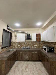 Kitchen Image of 1150 Sq.ft 2 BHK Builder Floor for rent in Sector 52A Gurgaon for Rs. 65000