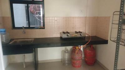 Kitchen Image of 1050 Sq.ft 2 BHK Apartment / Flat for sale in Wagholi Pune for Rs. 6000000