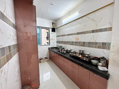 Kitchen Image of 995 Sq.ft 2 BHK Apartment / Flat for sale in Manohar Vikas Shreeji Paraiso Phase 2, Badlapur East Badlapur for Rs. 5500000