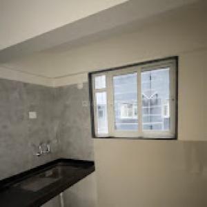 Kitchen Image of 945 Sq.ft 2 BHK Apartment / Flat for sale in Gini Vivante, Kiwale Pune for Rs. 6800000