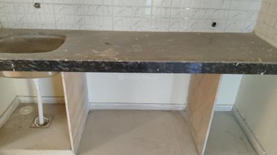 Kitchen Image of 710 Sq.ft 1 BHK Apartment / Flat for sale in Pushpak Nagar Navi Mumbai for Rs. 4400000