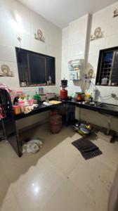 Kitchen Image of PG in Wadgaon Sheri, Pune