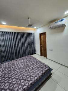 Bedroom Image of 1100 Sq.ft 3 BHK Apartment / Flat for rent in Shambhu Savan Signet, Radhika Park Rajkot for Rs. 34000