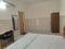 Bedroom Image of Smart Living PG in Sector 63, Noida