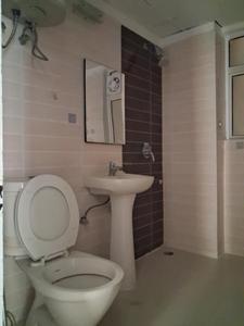 Common Bathroom Image of 1075 Sq.ft 2.5 BHK Apartment / Flat for sale in Amrapali Zodiac, Sector 120 Noida for Rs. 10300000