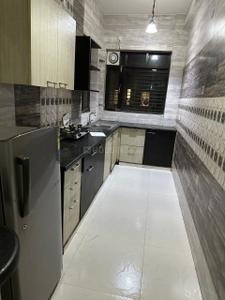 Kitchen Image of 1100 Sq.ft 2 BHK Builder Floor for rent in Sector 52 Gurgaon for Rs. 36000