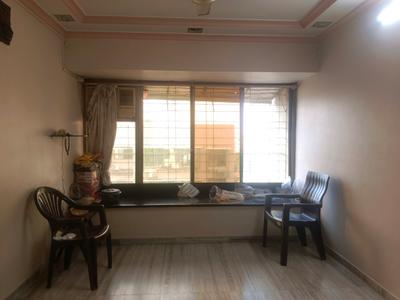 Living Room Image of 875 Sq.ft 2 BHK Apartment / Flat for sale in Kandivali West Mumbai for Rs. 15000000