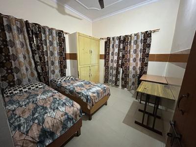 Bedroom Image of Omjee Paying Guest in Garhi Cantt, Dehradun