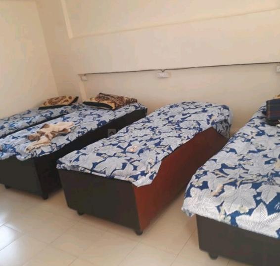 Bedroom Image of Raja pg in Goregaon West, Mumbai
