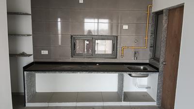 Kitchen Image of 990 Sq.ft 3 BHK Apartment / Flat for sale in Ayunam Greens, Kudasan Gandhinagar for Rs. 9000000