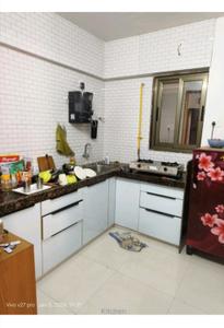 Kitchen Image of 771 Sq.ft 1 BHK Apartment / Flat for rent in Pal Surat for Rs. 18000