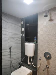 Common Bathroom One Image of 700 Sq.ft 1 BHK Apartment / Flat for rent in Unnati Woods Phase 7, Kasarvadavali Thane for Rs. 17000
