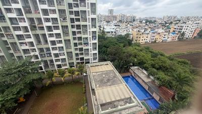 Balcony Image of 900 Sq.ft 2 BHK Apartment / Flat for rent in Chandrarang Basileo, Pimple Gurav Pune for Rs. 37000
