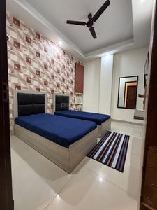 Bedroom Image of Ganesh Living PG in Sector 28, Gurgaon