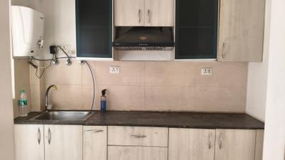 Kitchen Image of 954 Sq.ft 2 BHK Apartment / Flat for rent in Supertech The Romano, Sector 118 Noida for Rs. 21000