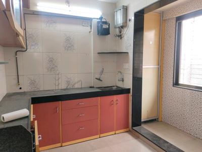 Kitchen Image of 600 Sq.ft 1 BHK Apartment / Flat for sale in Suyash Tower, Kopar Khairane Navi Mumbai for Rs. 9800000