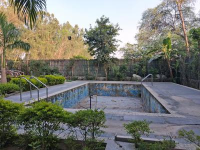 Swimming Pool Image of 1999 Sq.ft 3 BHK Villa for sale in Dkrrish Alaska Farms, Nagli Bahrampur Noida for Rs. 15000000